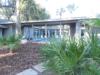 Walking up to the side of the house from the lagoon