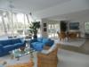 End of living room into dining area that seat 8 comfortably