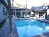 Sunny fenced pool.